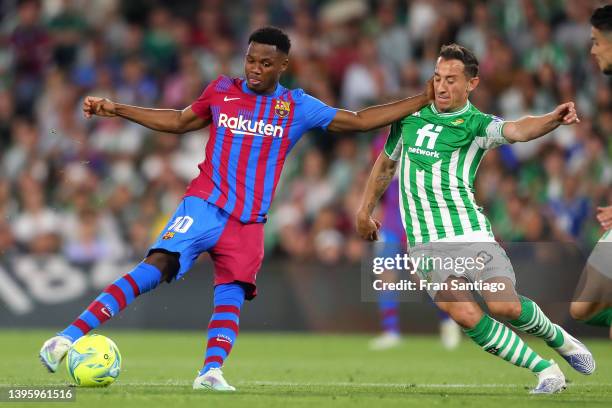 Ansu Fati of FC Barcelona scores their team's first goal during the La Liga Santander match between Real Betis and FC Barcelona at Estadio Benito...
