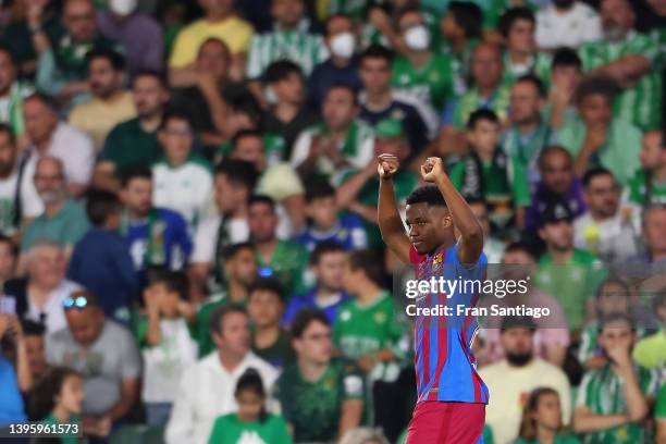 Ansu Fati of FC Barcelona celebrates after scoring their team's first goal during the La Liga Santander match between Real Betis and FC Barcelona at...