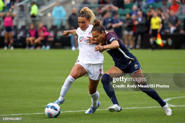 Trinity Rodman of the Washington Spirit is defended by Jaelene Daniels of the North Carolina Courage during a game between Washington Spirit and...