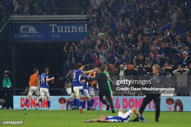 Rodrigo Zalazar of FC Schalke 04 celebrates with teammates after scoring their team's third goal during the Second Bundesliga match between FC...