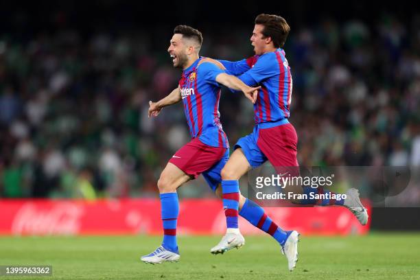 Jordi Alba of FC Barcelona celebrates after scoring his team's second goal with teammate Riqui Puig after scoring their team's second goal during the...