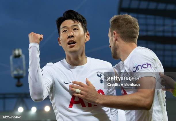 Son Heung-Min of Tottenham Hotspur celebrates scoring with team mate Harry Kane during the Premier League match between Liverpool and Tottenham...