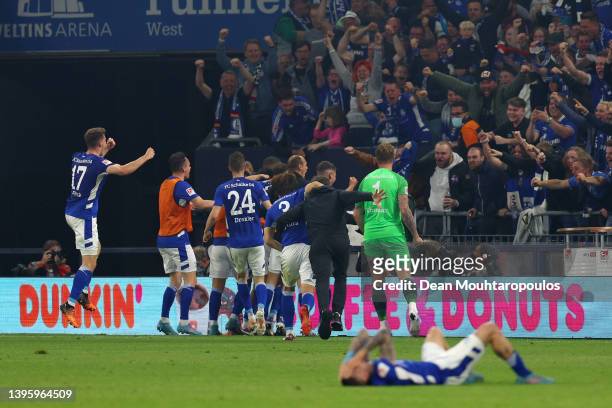 Rodrigo Zalazar of FC Schalke 04 celebrates with teammates after scoring their team's third goal during the Second Bundesliga match between FC...