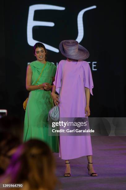 Margarita Ruyra de Andrade, founder of Es Fascinante, explains the dress worn by the model at the Day Vs. Evening fashion Show during San Sebastian...