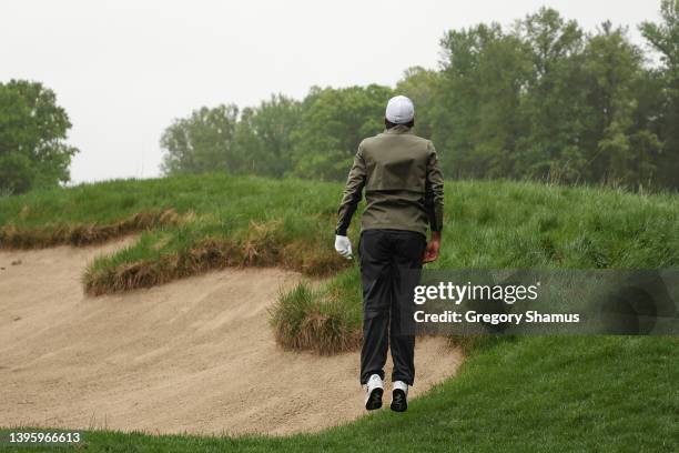 Jason Day of Australia prepares to play his second shot on the eighth hole during the third round of the Wells Fargo Championship at TPC Potomac...
