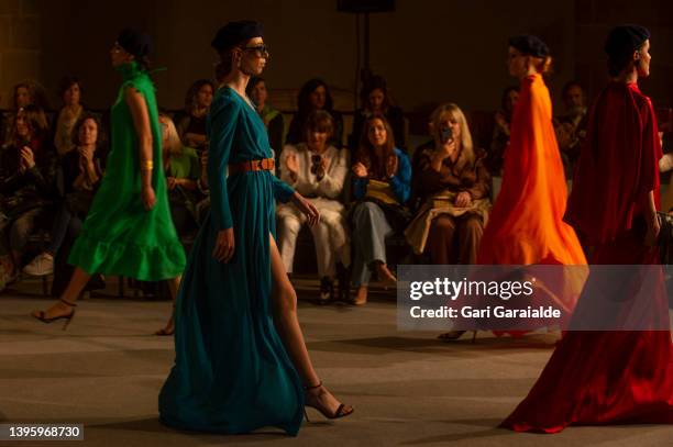 Models walk the runway at the Es Fascinante fashion Show during San Sebastian Moda Festival Spring-Summer 2022 at San Telmo Museum on May 07, 2022 in...