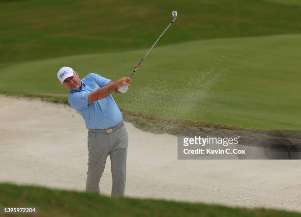 Rod Pampling of Australia plays a shot on the fifth hole during round two of the Mitsubishi Electric Classic at TPC Sugarloaf Golf Course on May 07,...