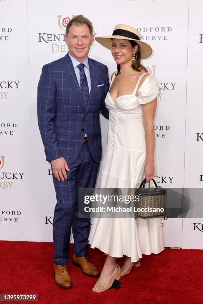 Bobby Flay and Christina Pérez attend the 148th Kentucky Derby at Churchill Downs on May 07, 2022 in Louisville, Kentucky.