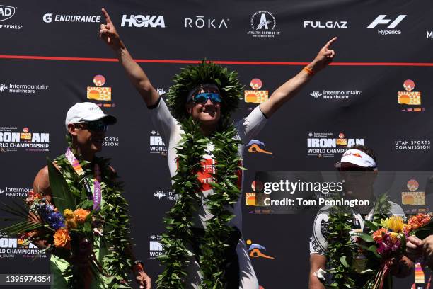 Second place finisher Lionel Sanders of Canada, first place winner Kristian Blummenfelt of Norway and third place finisher Braden Currie of Australia...