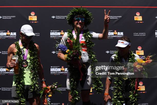 Second place finisher Lionel Sanders of Canada, first place winner Kristian Blummenfelt of Norway and third place finisher Braden Currie of Australia...