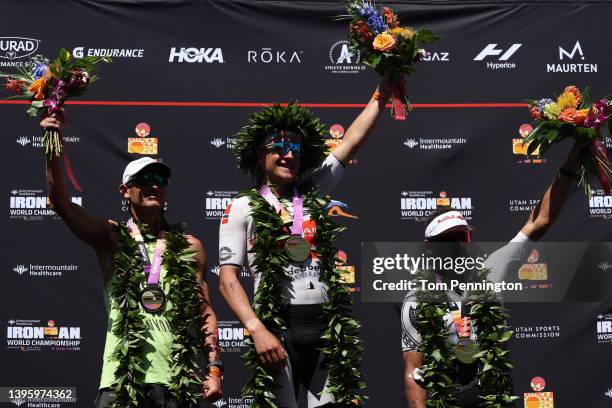 Second place finisher Lionel Sanders of Canada, first place winner Kristian Blummenfelt of Norway and third place finisher Braden Currie of Australia...