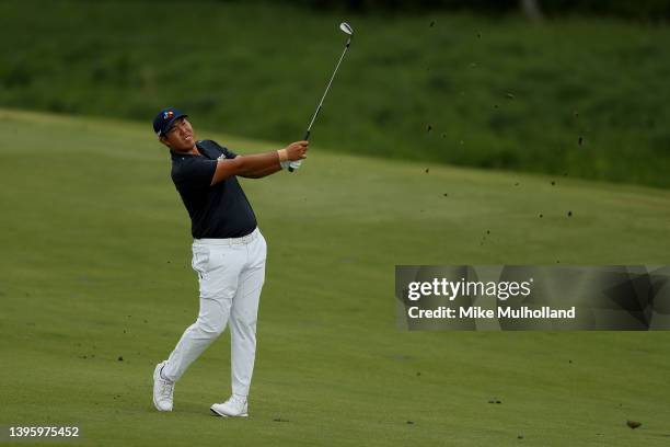 Byeong Hun An of South Korea hits his approach shot on the eighth hole during the third round of the Simmons Bank Open for the Snedeker Foundation at...