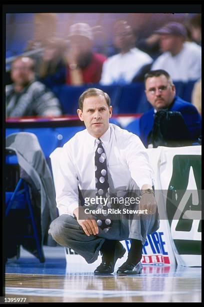 Coach John Beilein of the Canisius Griffs watches his players during a game against the North Carolina at Charlotte 49ers at the Marine Midland Arena...