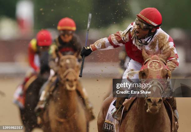 Jockey Sonny Leon reacts as Rich Strike wins the 148th running of the Kentucky Derby at Churchill Downs on May 07, 2022 in Louisville, Kentucky.