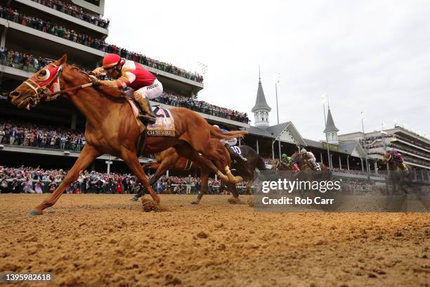 Rich Strike with Sonny Leon up crosses the finish line to win the 148th running of the Kentucky Derby at Churchill Downs on May 07, 2022 in...