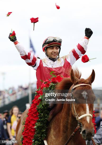 Jockey Sonny Leon celebrates after riding Rich Strike to a win in the 148th running of the Kentucky Derby at Churchill Downs on May 07, 2022 in...