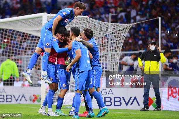 Players of Cruz Azul celebrate after winning the playoff match between Cruz Azul and Necaxa as part of the Torneo Grita Mexico C22 Liga MX at Azteca...