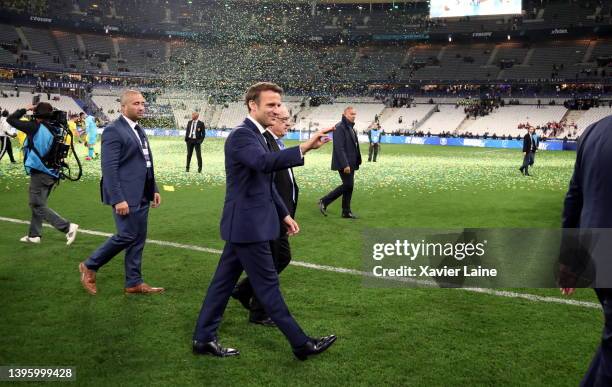 French president Emmanuel Macron reacts after the French Cup Final between FC Nantes and OGC Nice at Stade de France on May 07, 2022 in Paris, France.