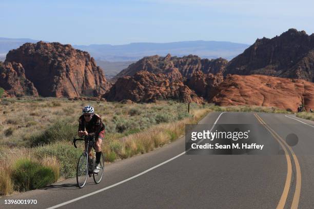 John Wragg of Canada competes on the bike during the 2021 IRONMAN World Championship on May 07, 2022 in St George, Utah.