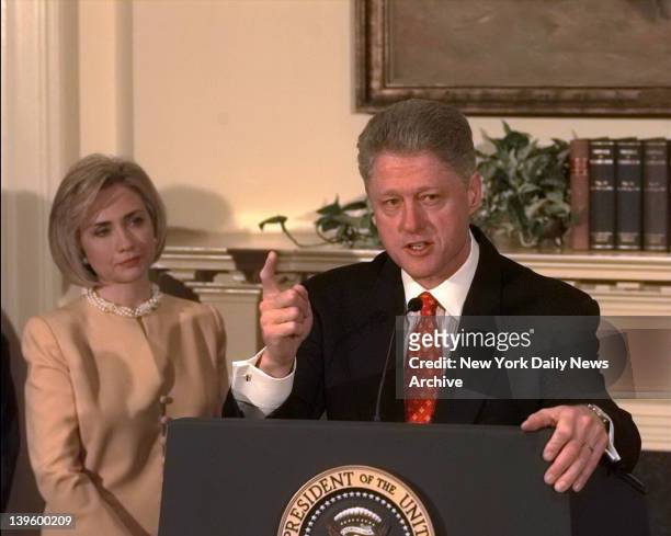 President Bill Clinton shakes his finger as he denies improper behavior with Monica Lewinsky, in the White House Roosevelt Room. "I did not have...