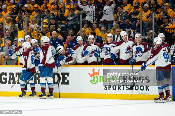 Artturi Lehkonen of the Colorado Avalanche, Erik Johnson of the Colorado Avalanche celebrate Nazem Kadri's of the Colorado Avalanche goal during the...