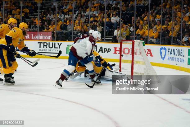 Gabriel Landeskog of the Colorado Avalanche scores on Connor Ingram of the Nashville Predators on the power play during the second period of game...