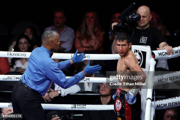 Christian Gomez receives a count from referee Kenny Bayless during his welterweight bout against Shakhram Giyasov at T-Mobile Arena on May 07, 2022...