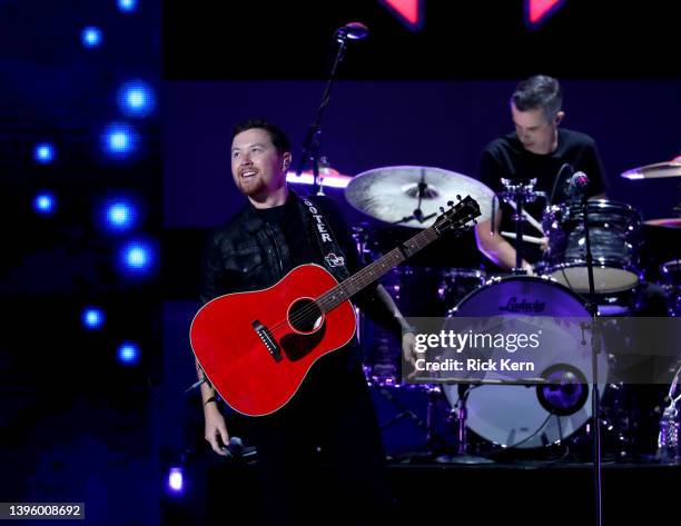 Scotty McCreery performs onstage during the 2022 iHeartCountry Festival presented by Capital One at the new state-of-the-art venue Moody Center on...