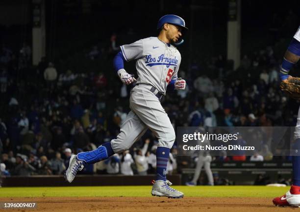 Mookie Betts of the Los Angeles Dodgers hits a home run during the ninth inning of Game Two of a doubleheader against the Chicago Cubs at Wrigley...