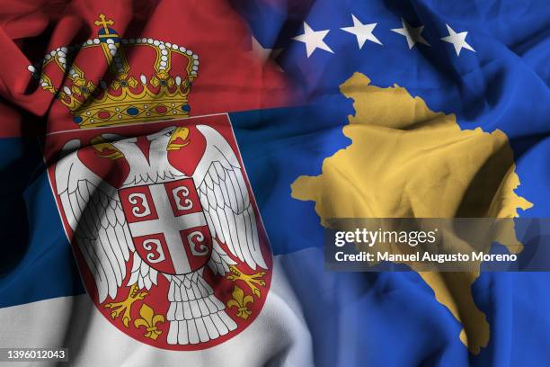 flags of serbia and kosovo - serbian flag stock-fotos und bilder