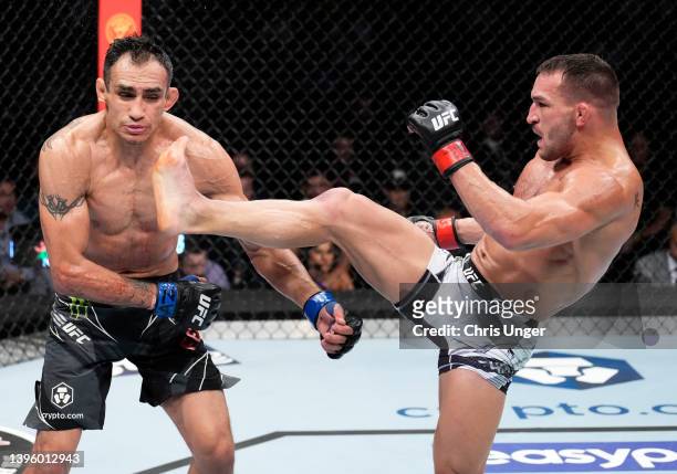 Michael Chandler knocks out Tony Ferguson in a lightweight fight during the UFC 274 event at Footprint Center on May 07, 2022 in Phoenix, Arizona.