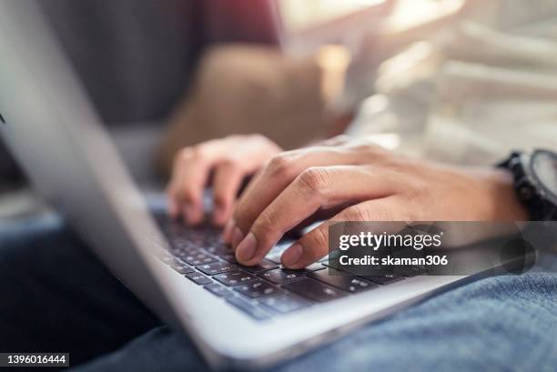 positive emotion asian young adult freelance (digital nomad) happiness using  laptop working at home domestic life - order pad stock pictures, royalty-free photos & images