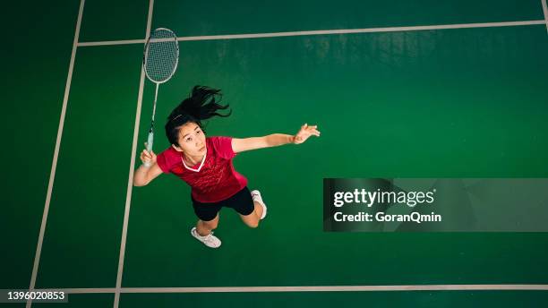 《badminton spirit》smash - badminton smash stock pictures, royalty-free photos & images