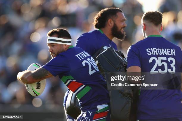 Jazz Tevaga of the Warriors warms up during the round nine NRL match between the Cronulla Sharks and the New Zealand Warriors at PointsBet Stadium,...