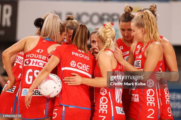 The Swifts form a huddle as they prepare for the start of the round eight Super Netball match between GWS Giants and NSW Swifts at Ken Rosewall...