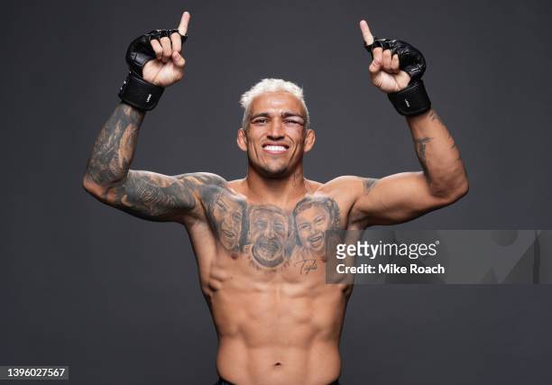 Charles Oliveira of Brazil poses for a portrait after his victory during the UFC 274 event at Footprint Center on May 07, 2022 in Phoenix, Arizona.