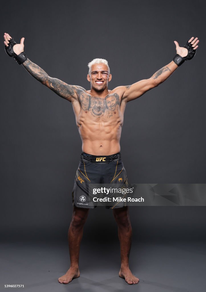 Charles Oliveira Of Brazil Poses For A Portrait After His Victory charles-oliveira-of-brazil-poses-for-a-portrait-after-his-victory