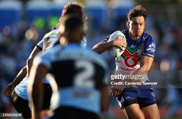 Daejarn Asi of the Warriors is tackled during the round nine NRL match between the Cronulla Sharks and the New Zealand Warriors at PointsBet Stadium,...