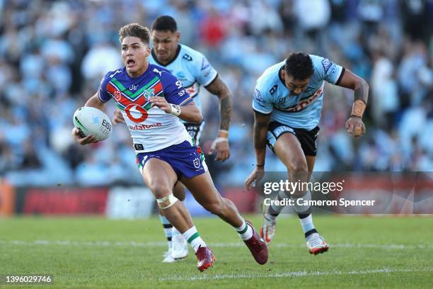 Reece Walsh of the Warriors makes a break during the round nine NRL match between the Cronulla Sharks and the New Zealand Warriors at PointsBet...