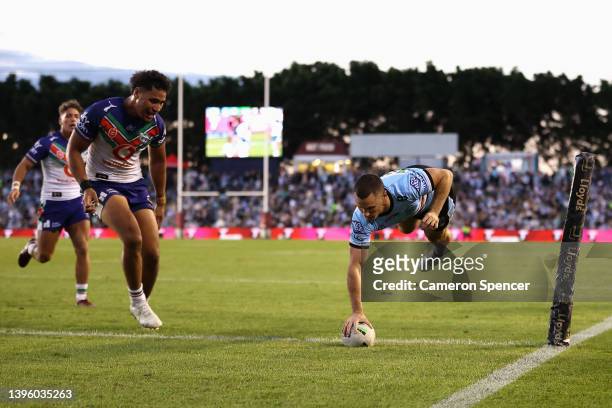 Connor Tracey of the Sharks scores a try during the round nine NRL match between the Cronulla Sharks and the New Zealand Warriors at PointsBet...