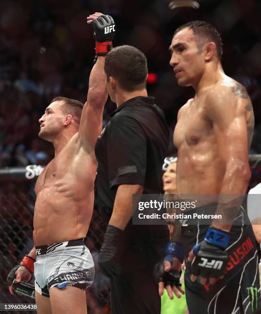 Michael Chandler celebrates after his knockout victory over Tony Ferguson in their men’s lightweight bout during UFC 274 at Footprint Center on May...