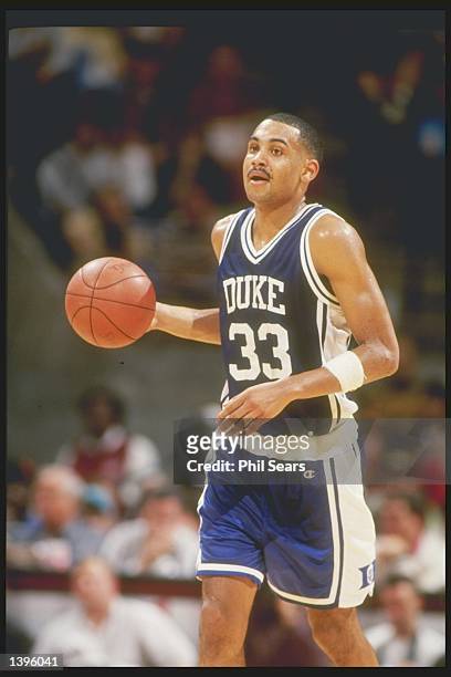 Forward Grant Hill of the Duke Blue Devils dribbles the ball down the court during a game against the Florida State Seminoles at the Leroy County...