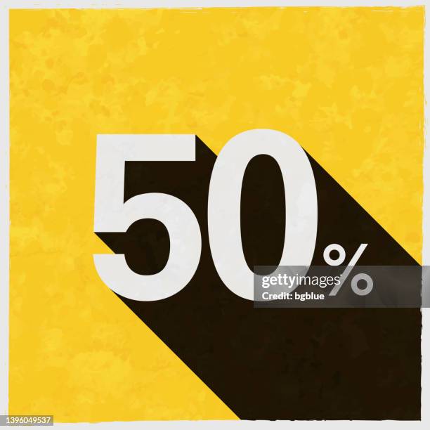 50% - fifty percent. icon with long shadow on textured yellow background - arts 50th stock illustrations