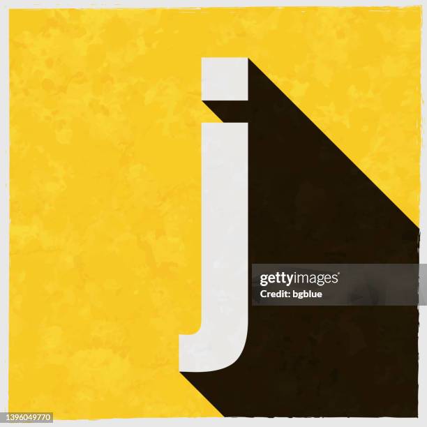 stockillustraties, clipart, cartoons en iconen met letter j. icon with long shadow on textured yellow background - letter j