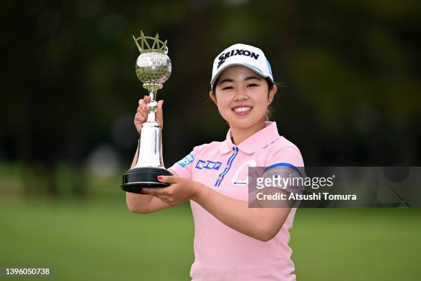 Miyuu Yamashita of Japan poses with the trophy after winning the tournament following the final round of World Ladies Championship Salonpas Cup at...