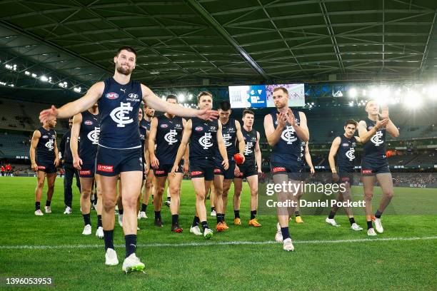 The Blues celebrate winning the round eight AFL match between the Carlton Blues and the Adelaide Crows at Marvel Stadium on May 08, 2022 in...