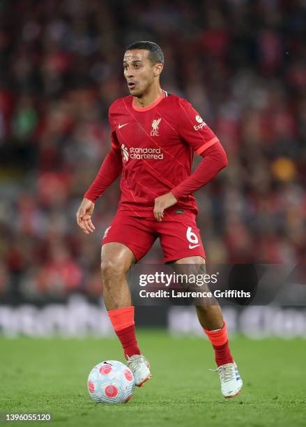 Thiago Alcantara of Liverpool runs with the ball during the Premier League match between Liverpool and Tottenham Hotspur at Anfield on May 07, 2022...