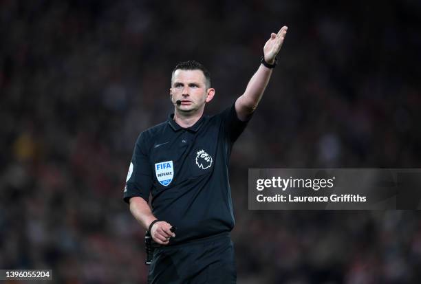 Referee, Michael Oliver looks on during the Premier League match between Liverpool and Tottenham Hotspur at Anfield on May 07, 2022 in Liverpool,...