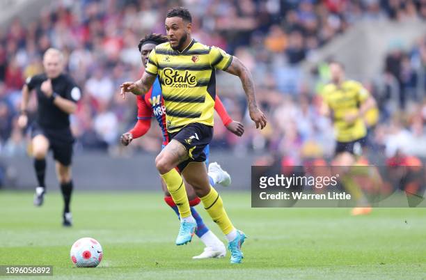 Michael Olise of Watford runs with the ball during the Premier League match between Crystal Palace and Watford at Selhurst Park on May 07, 2022 in...
