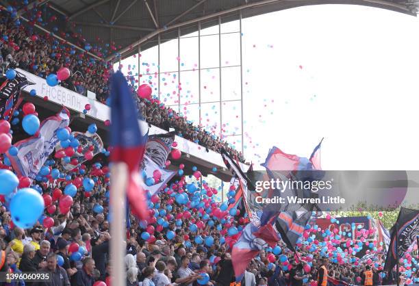 Crystal Palace fans release balloons ahead of the Premier League match between Crystal Palace and Watford at Selhurst Park on May 07, 2022 in London,...